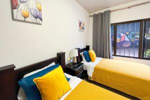 Letto o letti in una camera di Viva Guest House