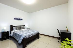 Letto o letti in una camera di Viva Guest House