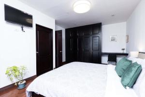 Letto o letti in una camera di Viva Guest House