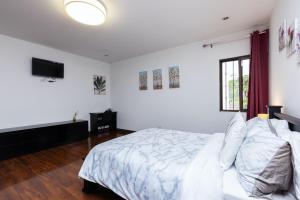 Letto o letti in una camera di Viva Guest House