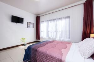 Letto o letti in una camera di Viva Guest House