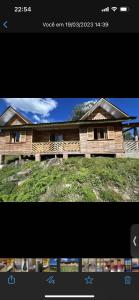 a picture of a house on a hill at Cabanas Romeu & Julieta in Cambara do Sul