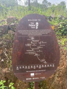 a sign for the papeete trail at Tranquilisle in Kandy