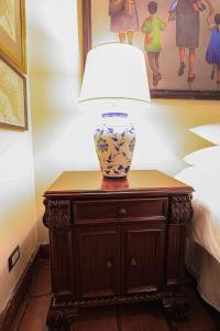 Postel nebo postele na pokoji v ubytování Hotel Casa Bansley