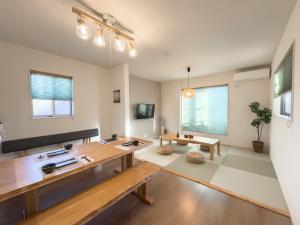 TV a/nebo společenská místnost v ubytování 大吉屋日赤館 名駅そばの一棟貸し