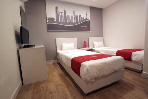 Postel nebo postele na pokoji v ubytování Jn Park Hotel Dongdaemun + 18 fotografií