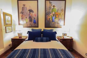 Postel nebo postele na pokoji v ubytování Hotel Casa Bansley