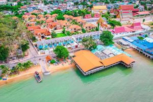 an aerial view of a resort on the water at Ocean Pool Villa Pattaya in Bang Sare