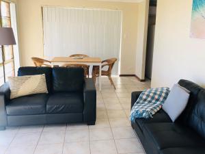 Setusvæði á API Preston Beach Front Apartments