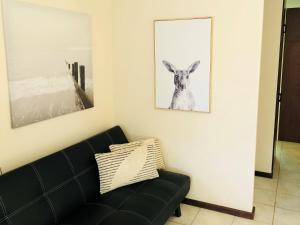 Setusvæði á API Preston Beach Front Apartments