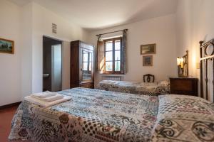 Postel nebo postele na pokoji v ubytování Villa Cucule + 37 fotografií