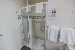 Koupelna v ubytování Hotel de France