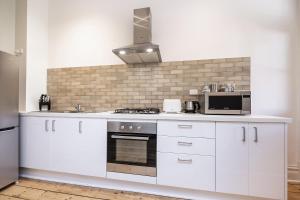 A cozinha ou cozinha compacta de Apartment Faro