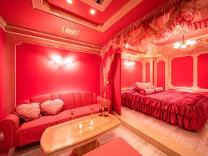 Postel nebo postele na pokoji v ubytování Roselips Tsuruhashi ローズリップス鶴橋adult only