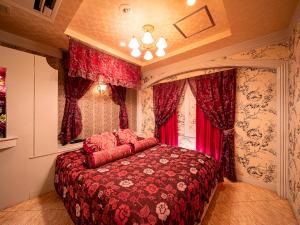 Postel nebo postele na pokoji v ubytování Roselips Tsuruhashi ローズリップス鶴橋adult only