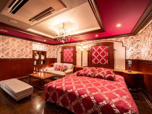 Postel nebo postele na pokoji v ubytování Roselips Tsuruhashi ローズリップス鶴橋adult only