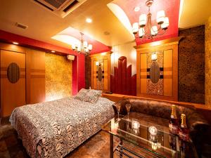 Postel nebo postele na pokoji v ubytování Roselips Tsuruhashi ローズリップス鶴橋adult only