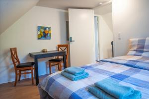 Postel nebo postele na pokoji v ubytování Cosy One Villa