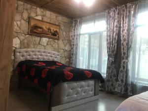 Krevet ili kreveti u jedinici u objektu Guest house in Dilijan Haghartsin
