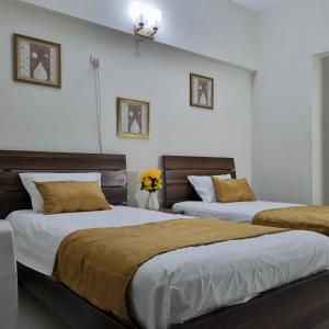 Lova arba lovos apgyvendinimo įstaigoje Eniter Two Bedrooms Luxry Apartment