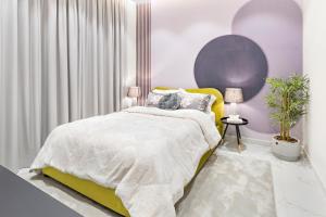 Postel nebo postele na pokoji v ubytování Amber Hospitality - Al Qairawan