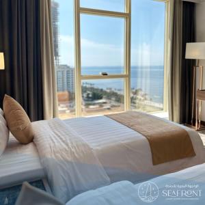 Posteľ alebo postele v izbe v ubytovaní Seafront Luxury Suites Jeddah Corniche