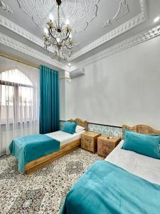 Ένα ή περισσότερα κρεβάτια σε δωμάτιο στο Khurjin Boutique Hotel