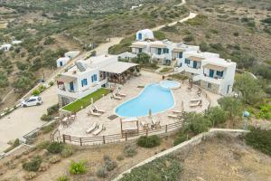 an aerial view of a villa with a swimming pool at Amorgion Village in Katapola