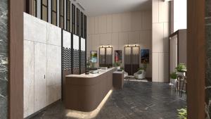 a bathroom with sinks and mirrors in a building at Oakwood Makati Avenue in Manila
