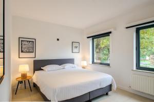 Voodi või voodid majutusasutuse Charmant Gents app met alle comfort en vlot bereikbaar toas