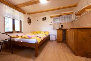 Postel nebo postele na pokoji v ubytování Miniresort AMULET