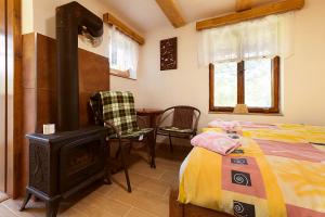Postel nebo postele na pokoji v ubytování Miniresort AMULET
