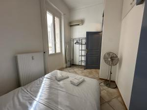 Posteľ alebo postele v izbe v ubytovaní C034-Appt fonctionnel - Centre Cannes