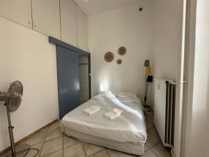 Posteľ alebo postele v izbe v ubytovaní C034-Appt fonctionnel - Centre Cannes