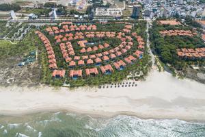 an aerial view of a resort on the beach at Resort Villa Da Nang Luxurious Abogo in Da Nang