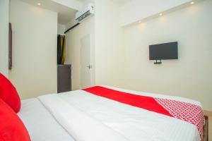 Katil atau katil-katil dalam bilik di OYO 18544 Amm Residency