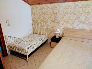 Postel nebo postele na pokoji v ubytování Mario's house