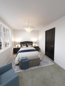 Een bed of bedden in een kamer bij Bond Street Mayfair Penthouse