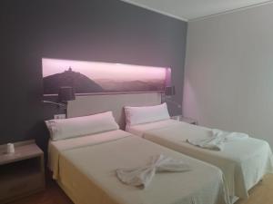 Postel nebo postele na pokoji v ubytování Hello Villarreal Suites