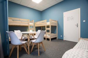 Posteľ alebo postele v izbe v ubytovaní Moon Hostel Wrocław
