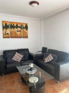 A seating area at Playa Paraiso 27E