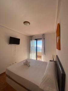 A television and/or entertainment centre at Playa Paraiso 27E