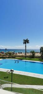 The swimming pool at or close to Playa Paraiso 27E