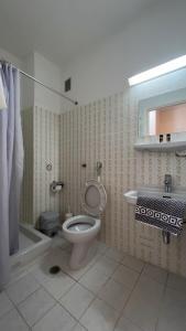 Koupelna v ubytování Hotel Cosmos
