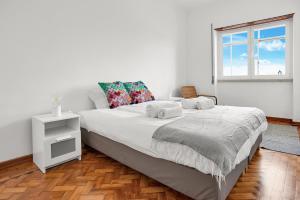 Легло или легла в стая в Sunny Apt in Almada with Tejo View