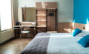 Giường trong phòng chung tại Hotel d'Alcantara