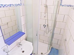 a bathroom with a shower and a toilet and a sink at B&B La Danza del Mare in Anacapri