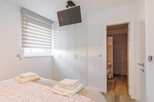 Posteľ alebo postele v izbe v ubytovaní Comfortable 2 bedroom apartment Marina close to beach
