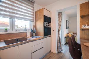 Kuchyňa alebo kuchynka v ubytovaní Comfortable 2 bedroom apartment Marina close to beach