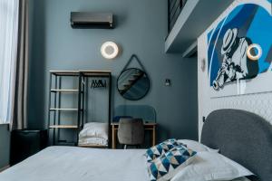 Giường trong phòng chung tại Hotel d'Alcantara